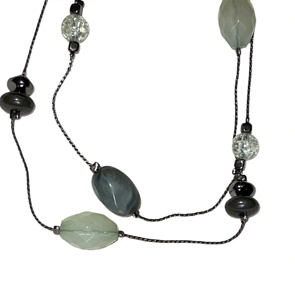 Double stranded designer necklace with multi faceted stones in euc